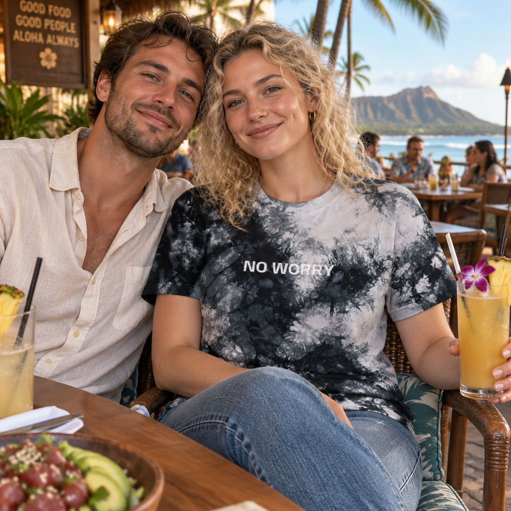 Lifestyle photo of the No Worry embroidered black and white tie-dye shirt outdoors
