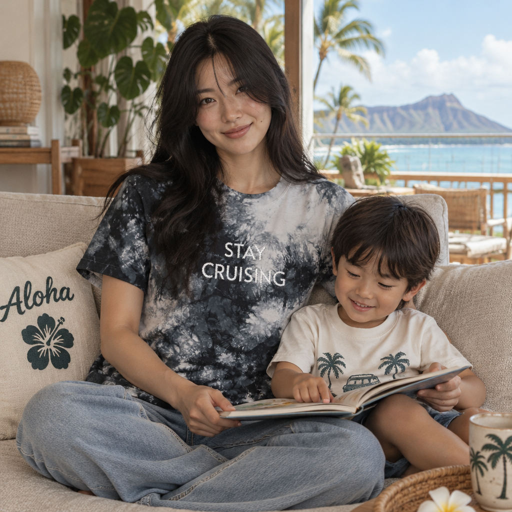 Lifestyle photo of the Stay Cruising embroidered tie-dye shirt by the ocean