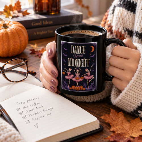 Dance Until Midnight Halloween mug with skeleton ballerinas held in a cozy fall setting