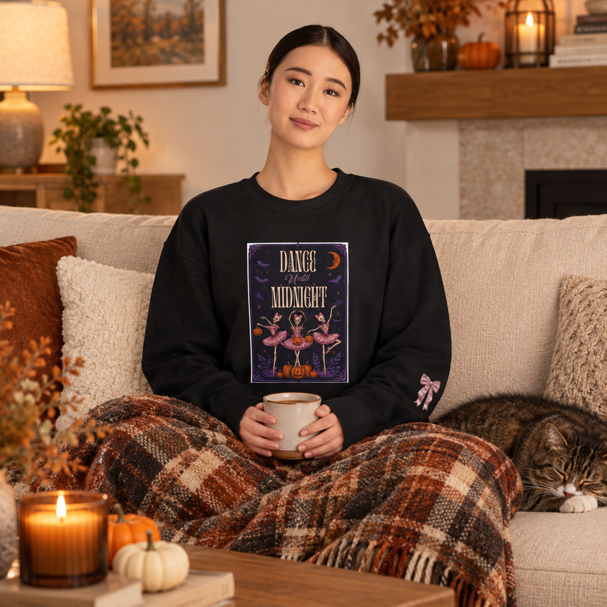 Dance at Midnight Halloween sweatshirt with skeleton ballerina panel in a lifestyle photo