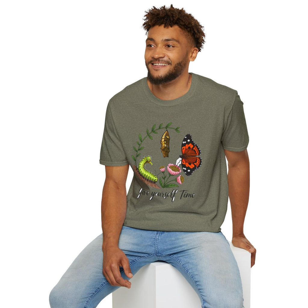 Man sitting wearing the heather military green Give Yourself Time butterfly tee