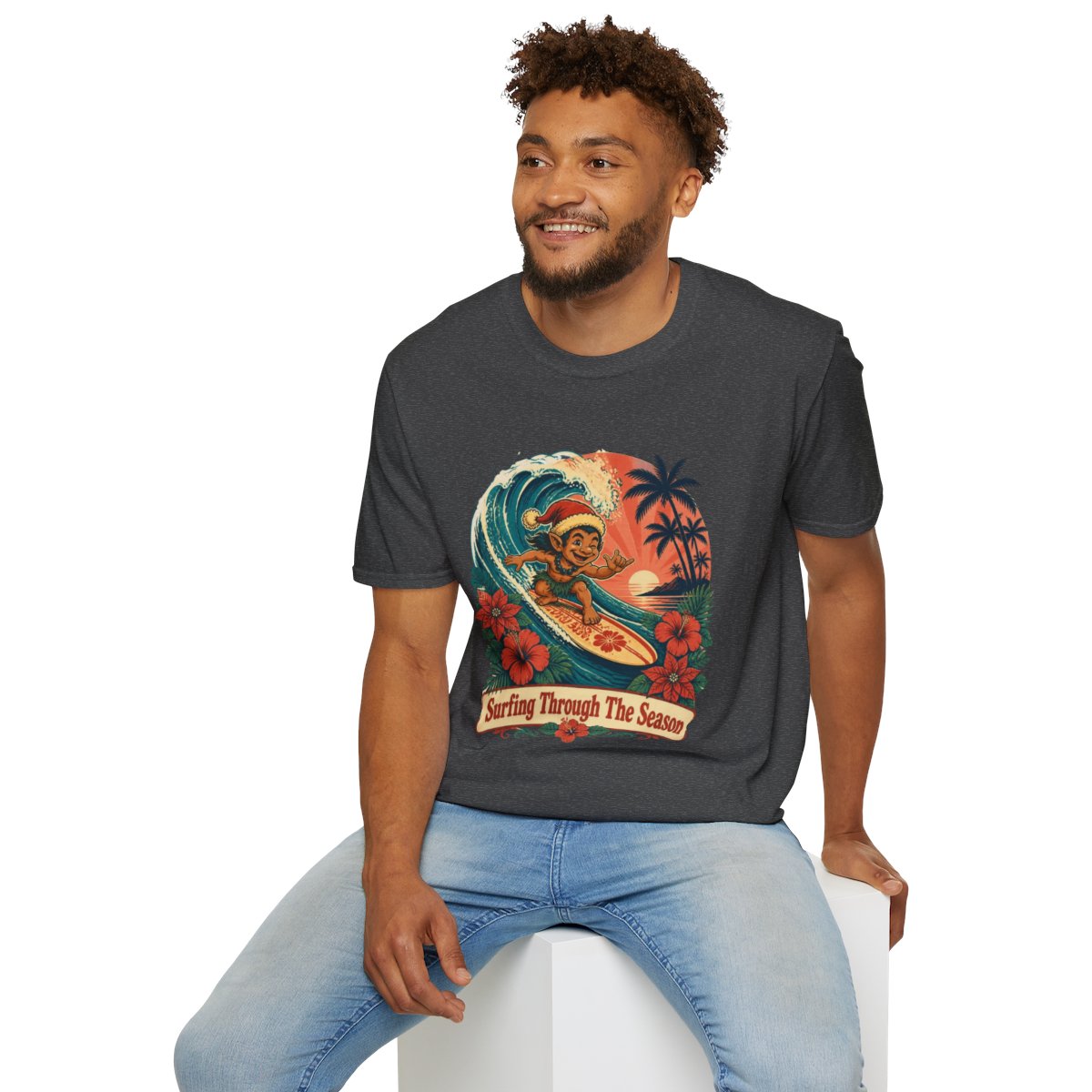 Menehune Surfing Through The Season tee in Dark Heather - seated model