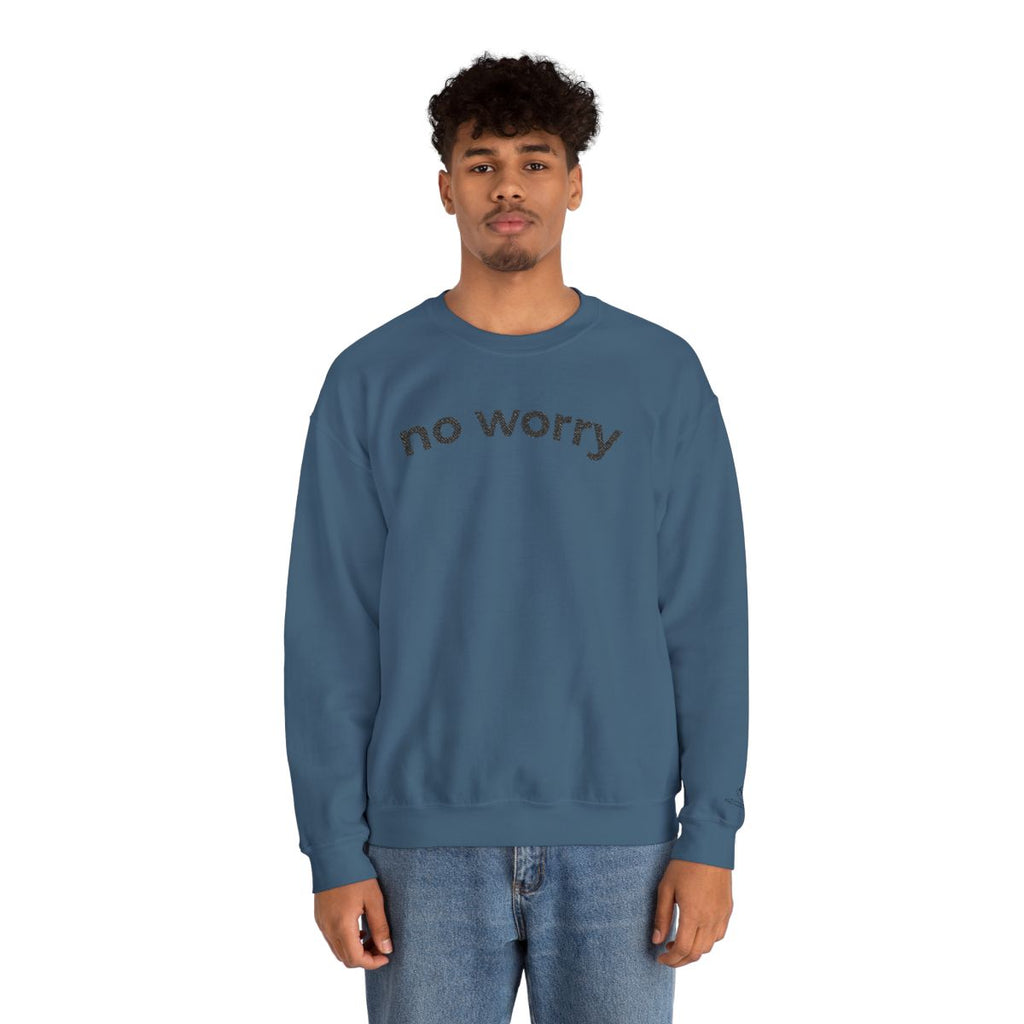 Man standing wearing the indigo blue No Worry crewneck