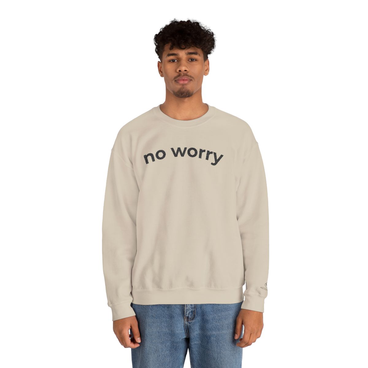 Man standing wearing the sand No Worry crewneck