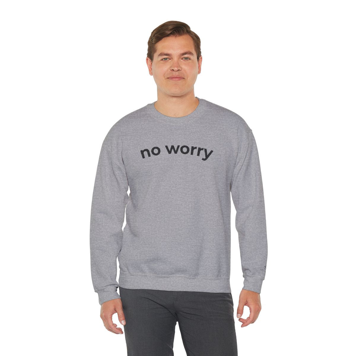 Man standing wearing the sport grey No Worry crewneck, second model