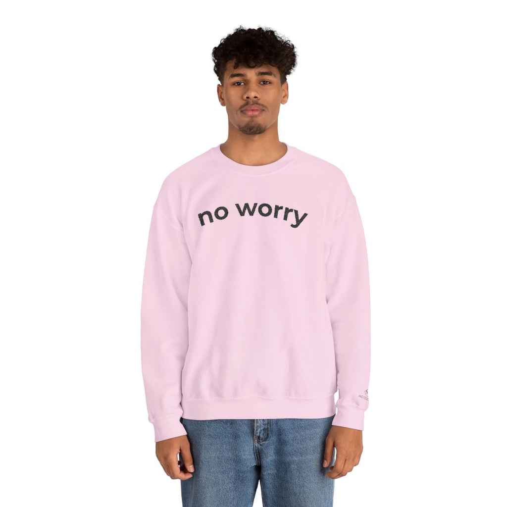 Man standing wearing the light pink No Worry crewneck