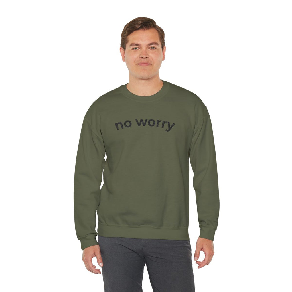Man standing wearing the military green No Worry crewneck, second model