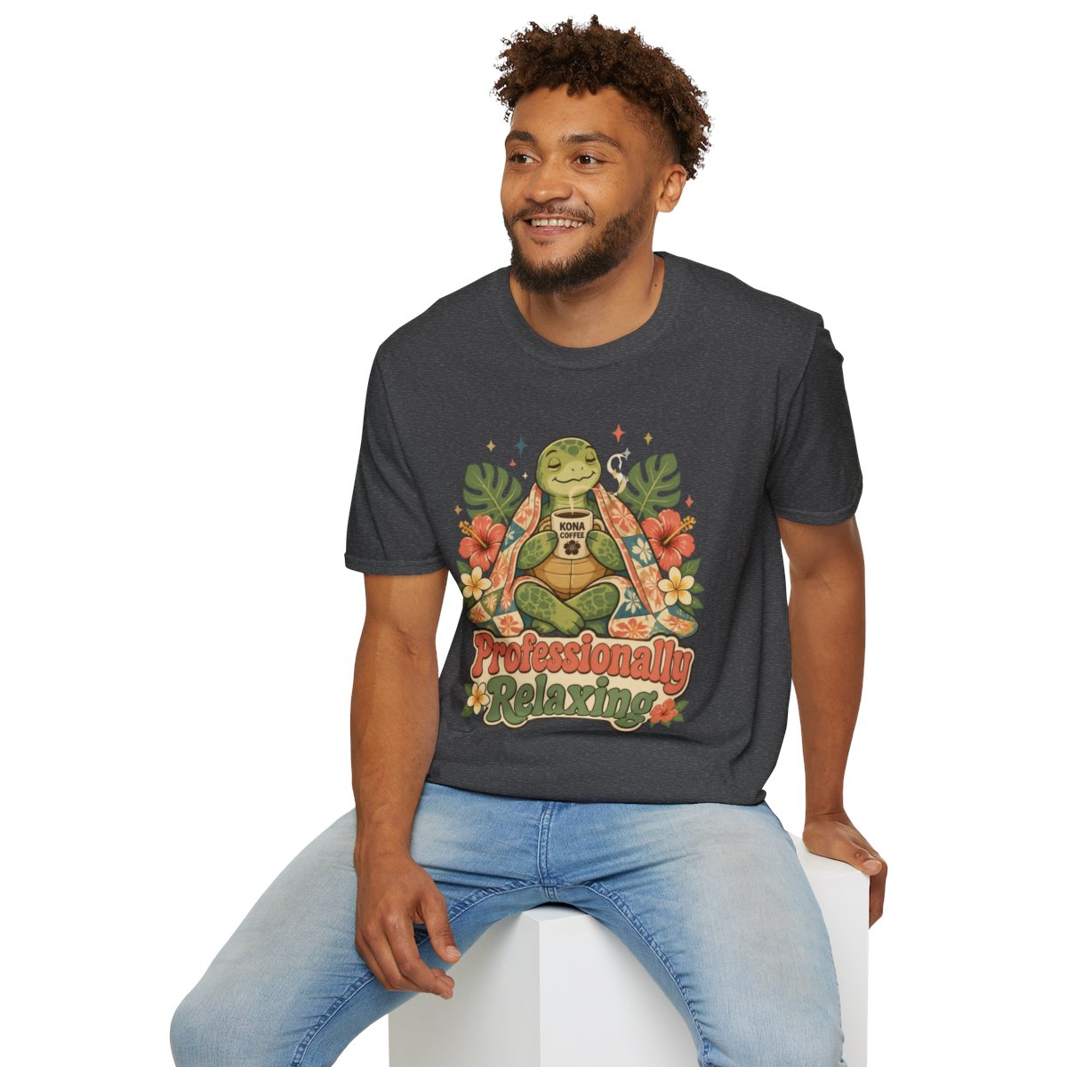 Man sitting wearing the dark heather Professionally Relaxing meditating turtle tee