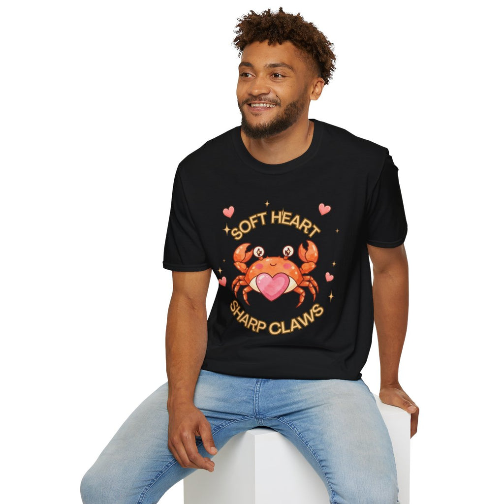 Man sitting wearing the black Soft Heart Sharp Claws crab tee